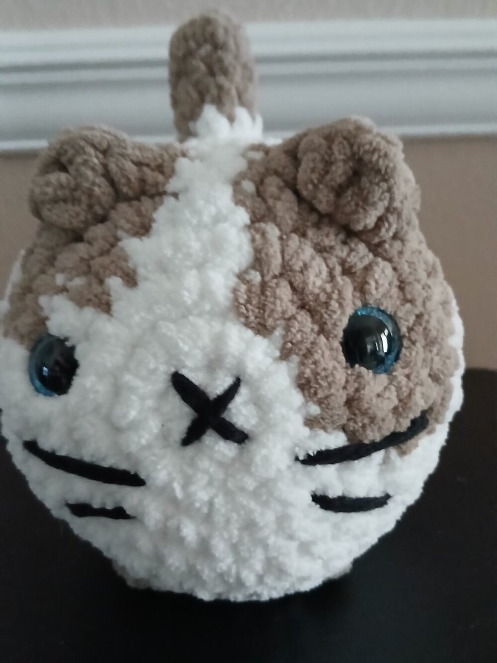 Brown and White Crocheted Loaf Cat Plush